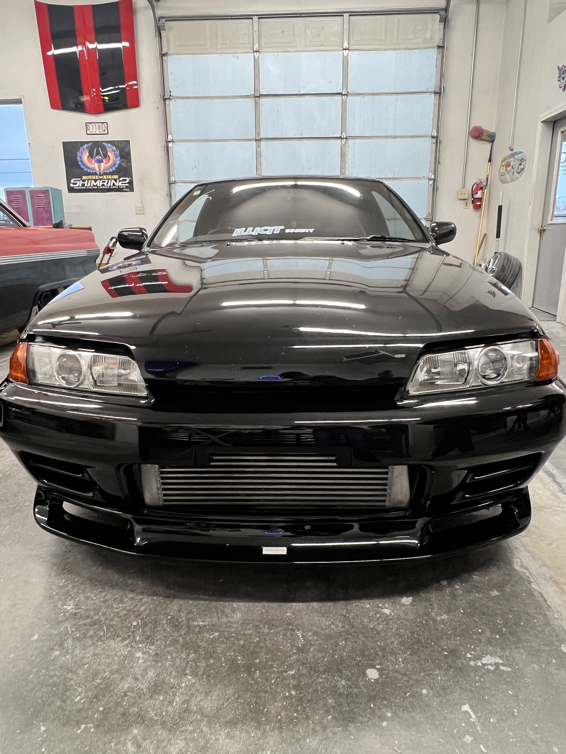 A Nissan Skyline repaired after a collision, back on the road at Sick Custom Collision Repair